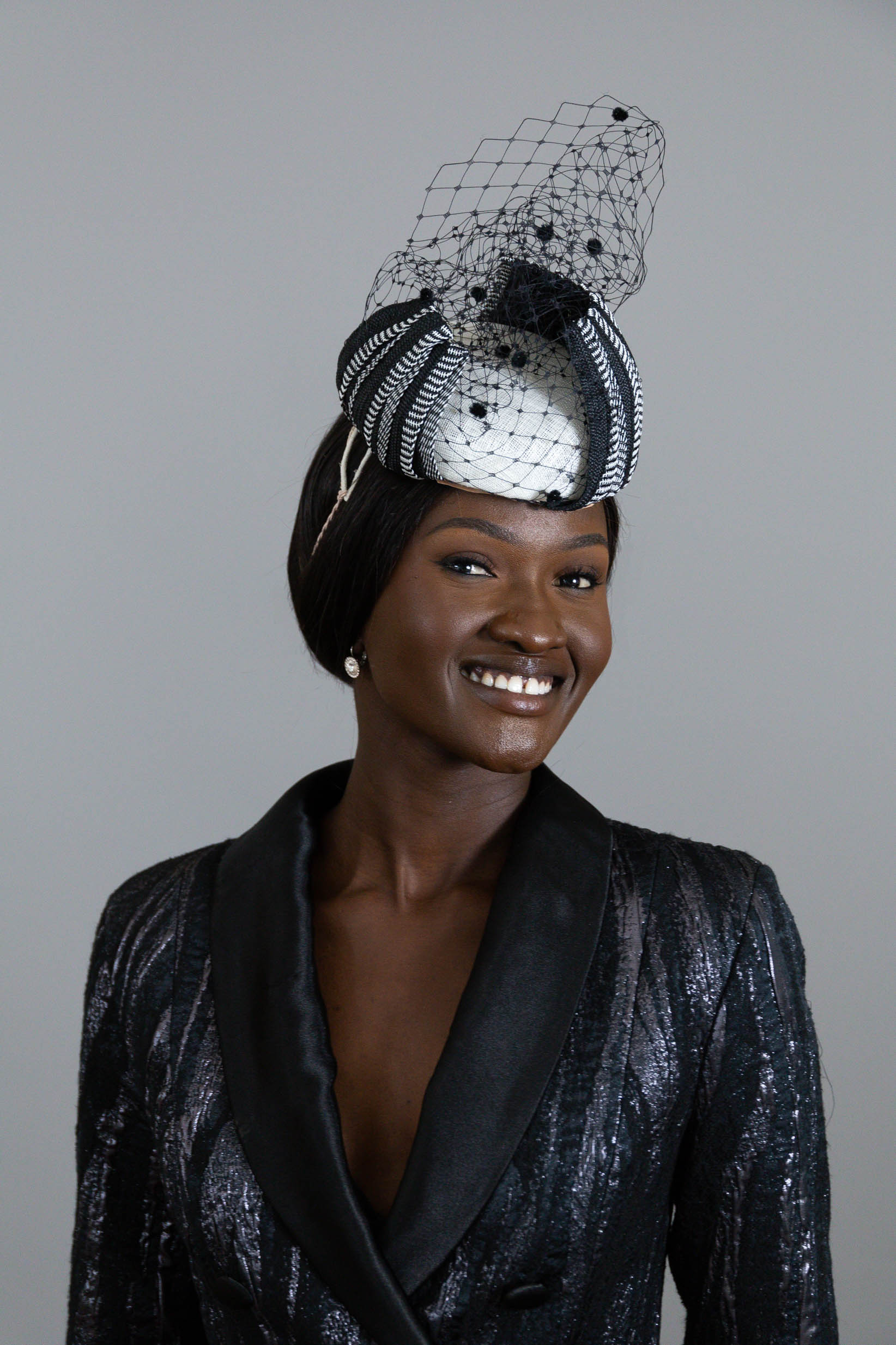 Monochrome Button Hat with Arching Stripes by Felicity Northeast Millinery