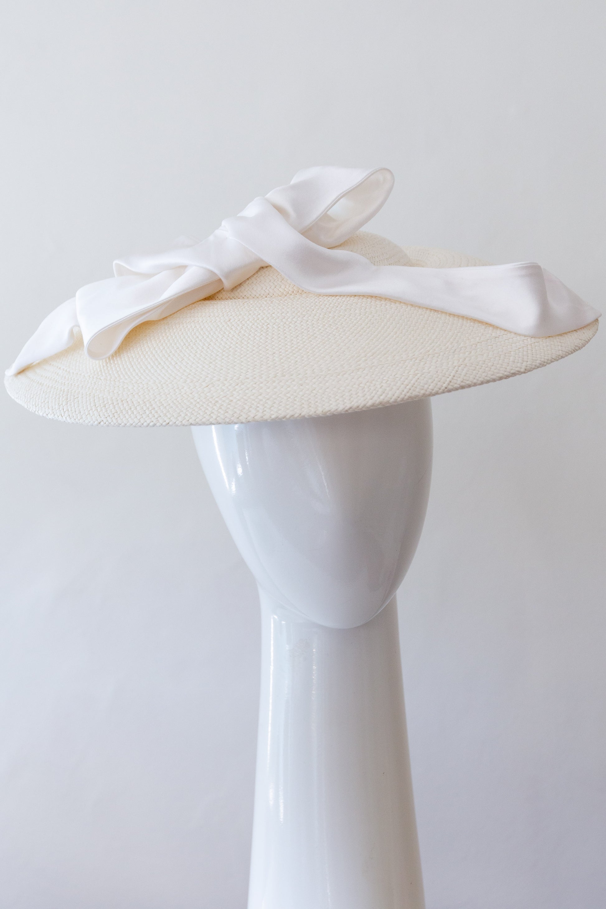 White Platter Hat with Silk Bow by Felicity Northeast Millinery