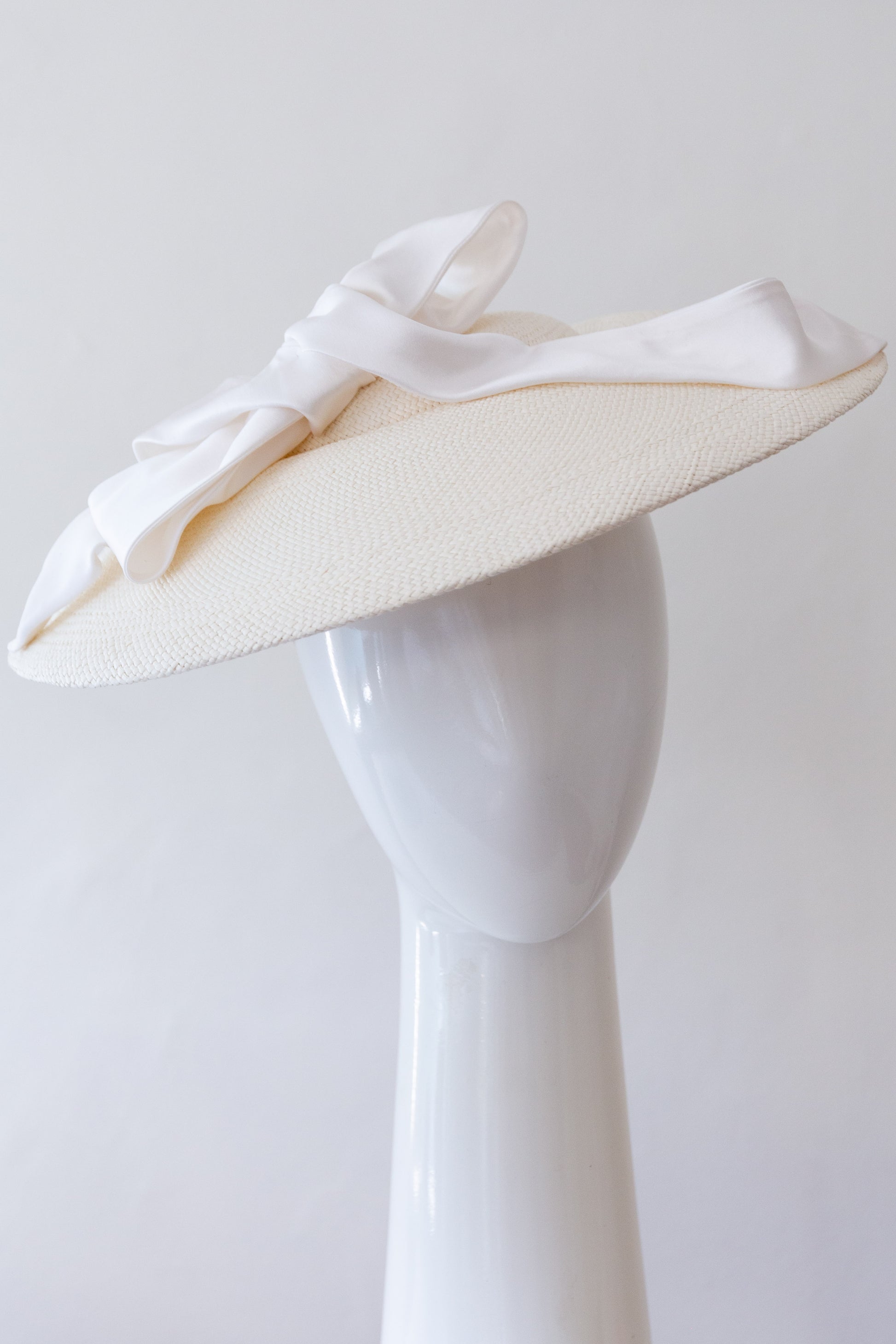 White Platter Hat with Silk Bow by Felicity Northeast Millinery