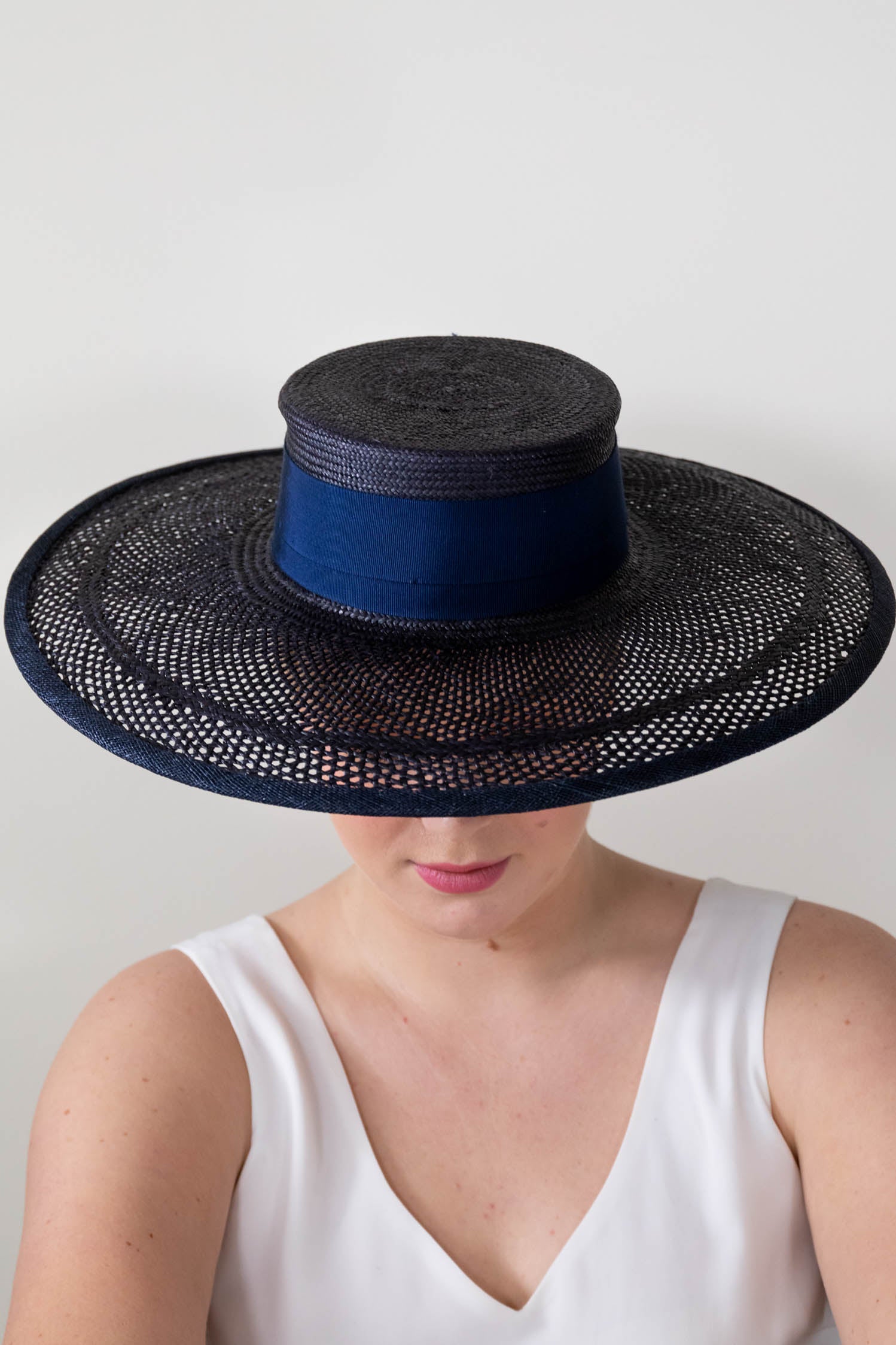Boater Style Hat in Navy Open Weave Straw By Felicity Northeast Millinery