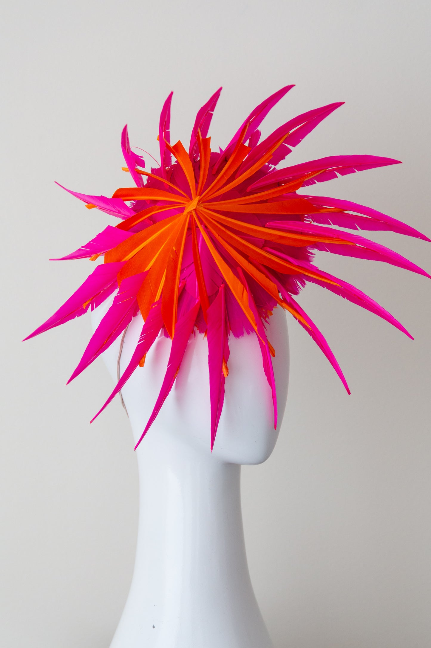 The Sculptured Feather Platter in Hot Pink and Orange by Felicity Northeast Millinery