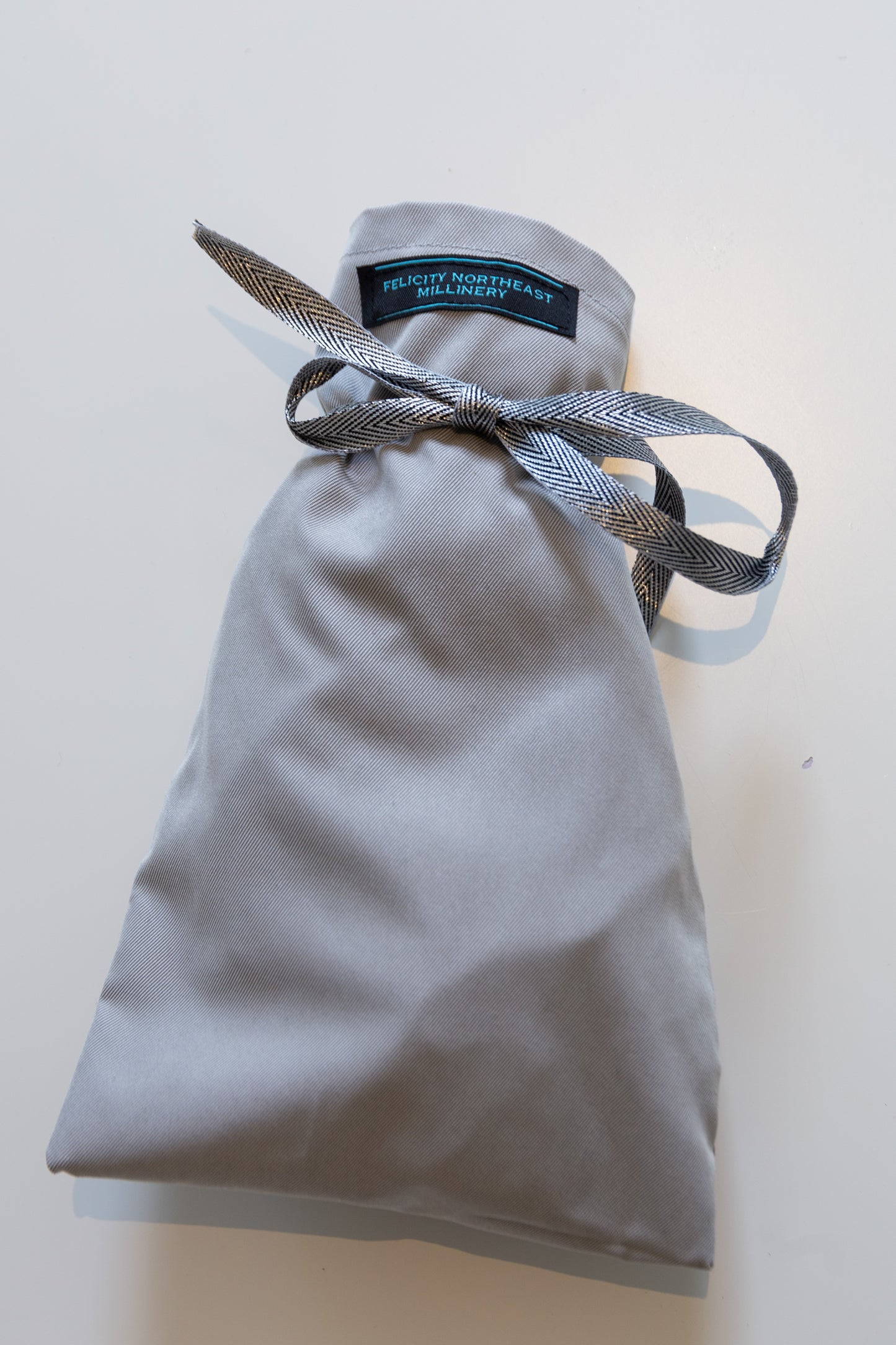 Foldable Bucket Rain Hat -Grey in waterproof travel bag by Felicity Northeast Millinery