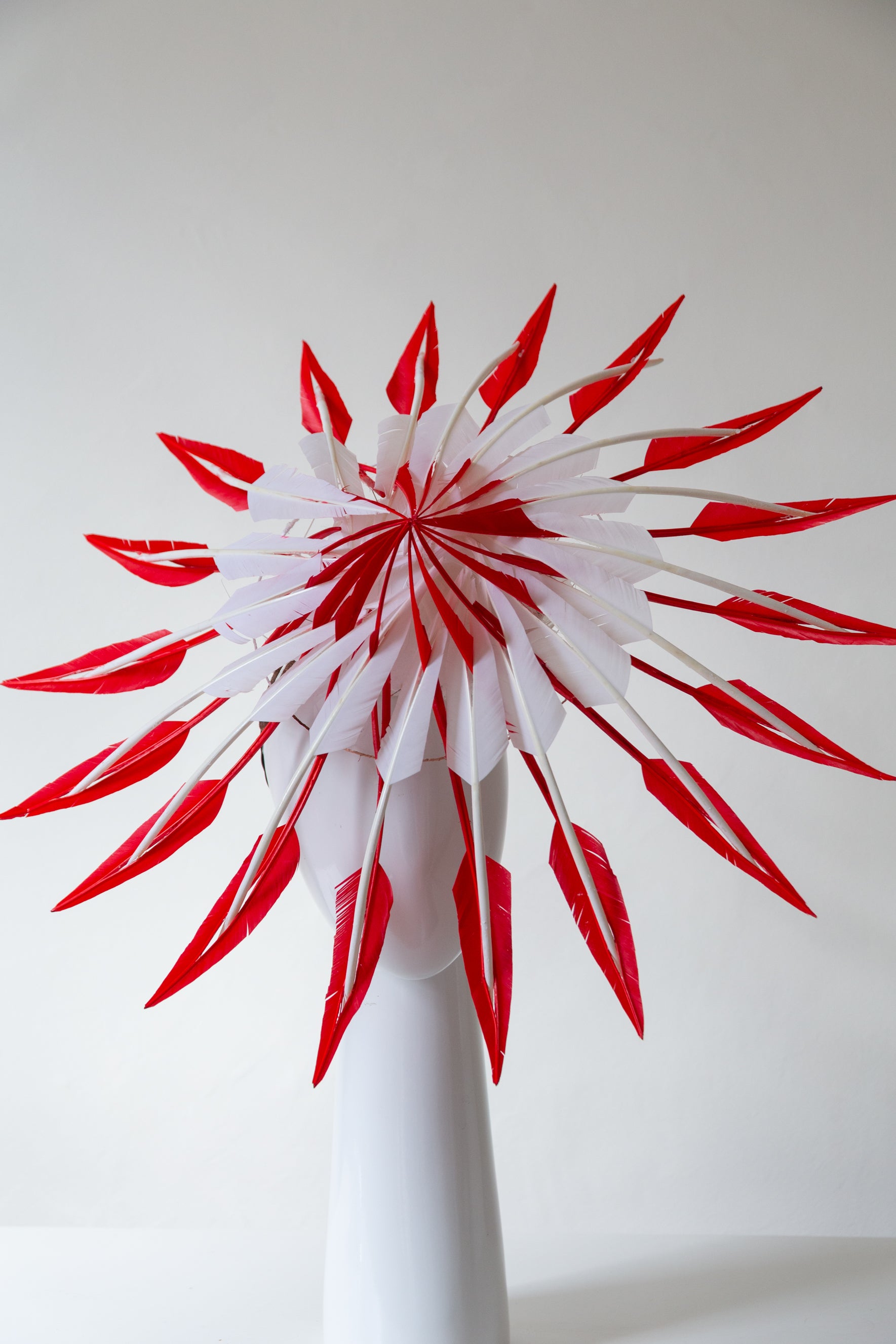 Sculptural Red and White Feather Hat by Felicity Northeast Millinery