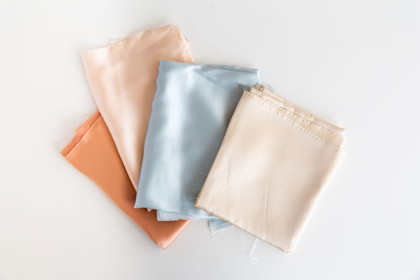 mask colours; salmon, blush, blue, cream