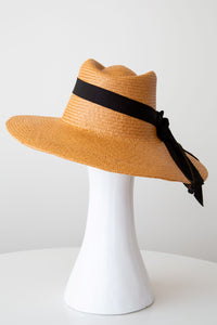 Tan fedora style sunhat with black ties and adjustable fit