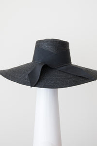 Black Milan braid straw wide brimmed sun hat, bavk view