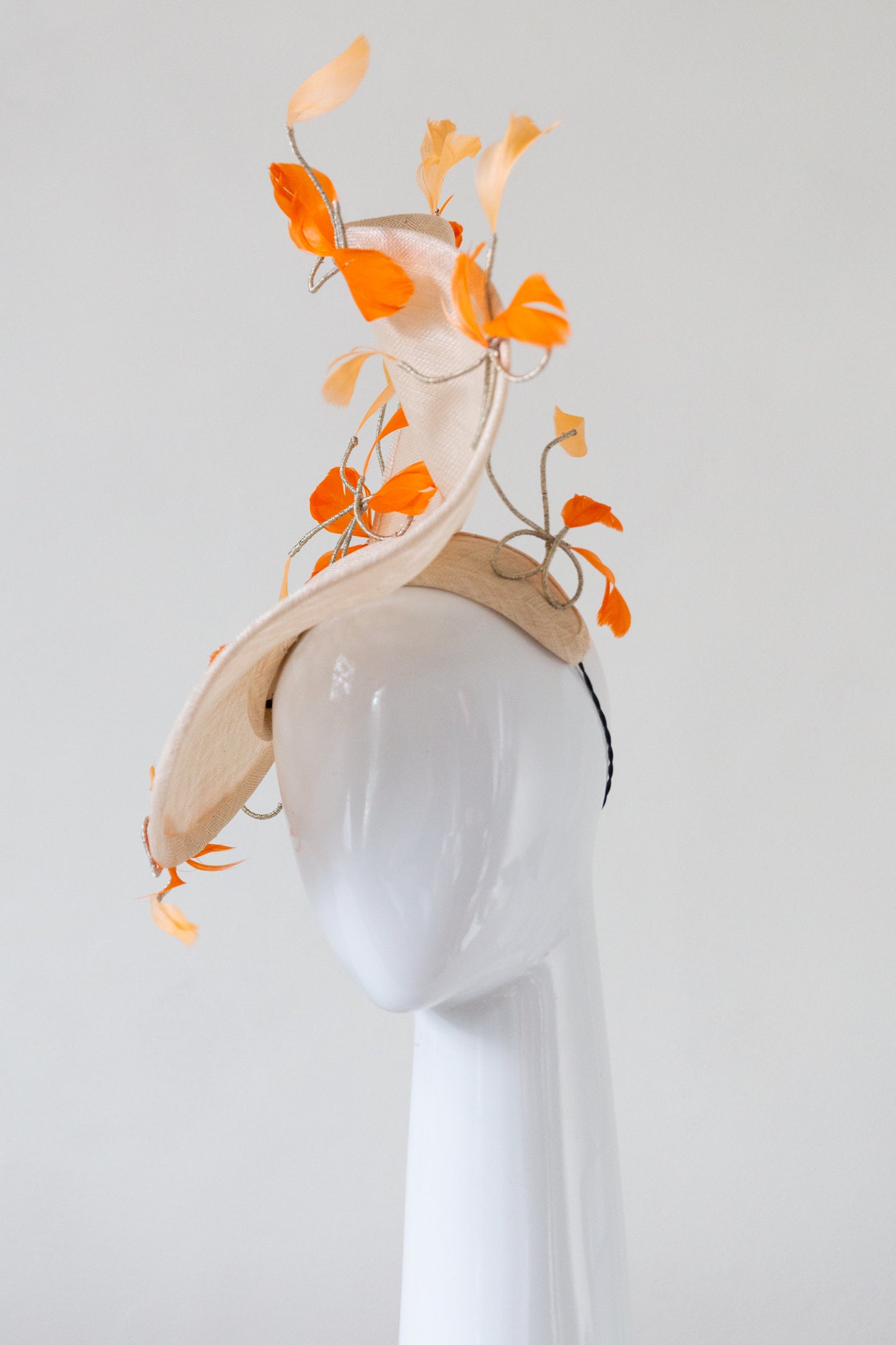 Sweeping Natural Platter with Orange Feathered Bows by Felicity Northeast Milliner