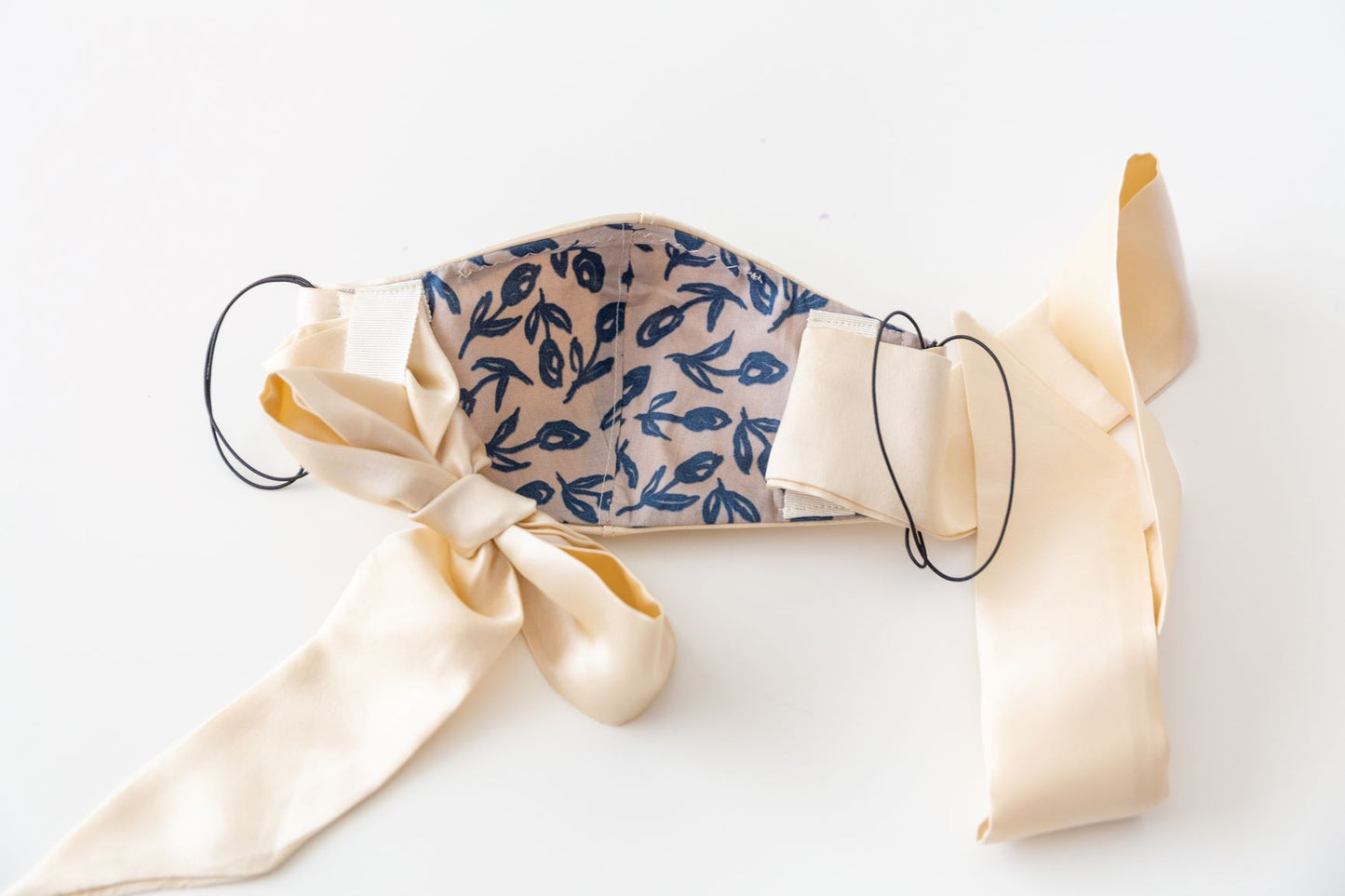 silk face mask, with ties. Inside fine cotton layer