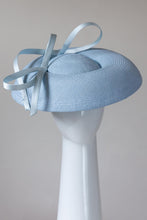 Load image into Gallery viewer, The Baby Blue Platter Hat with Sweeping Bows features a wide Dior brim with a shallow asymmetrical crown. Trimmed with lux satin silk bows on and under the brim