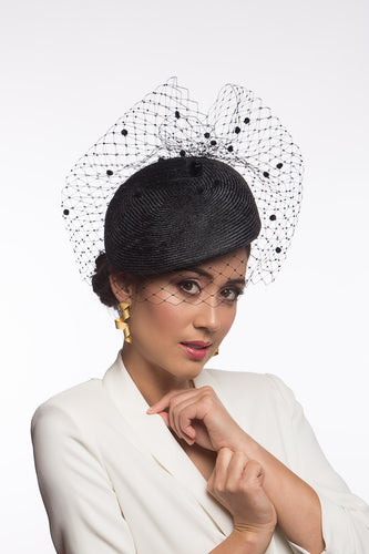 The Black Veil Designer Beret features a parisisal straw beret draped with vintage veiling