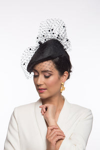 The Black Veil Designer Beret features a parisisal straw beret draped with vintage veiling