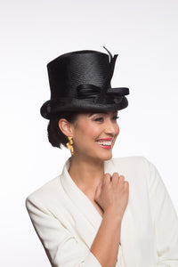 The Classic Black Top Hat features a curved top hat, trimmed with lux silk satin bow