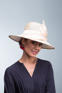 The Cream Fedora with Silk Trim is a modern fedora with a patterned straw crown and slightly curved wide brim