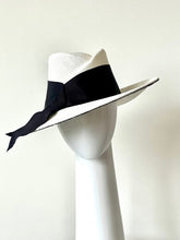 Load image into Gallery viewer, The White Panama Fedora with Black Trim is a modern fedora with a sweeping angular crown and features a wide brim which softly curves up.