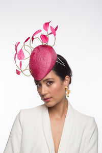 Hot Pink Beret with Floating Feathers is a straw beret and is designed to be worn at the centre of the forehead.