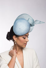 Load image into Gallery viewer, The Pale Blue Sculptured Beret style is an oval side beret Trimmed with curls of sinamay. Buy this millinery online or make an appointment to try it on