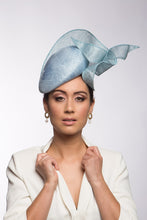 Load image into Gallery viewer, The Pale Blue Sculptured Beret style is an oval side beret Trimmed with curls of sinamay. Buy this millinery online or make an appointment to try it on