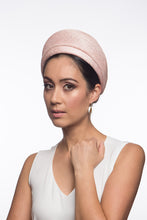 Load image into Gallery viewer, The Raised Pale Pink Halo Headband features a parisisal straw headband overlayed with a pale pink and silver flecked sinamay which adds lightness and height