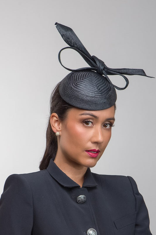 Raised Black Cocktail Hat with Bow by Felicity Northeast Millinery