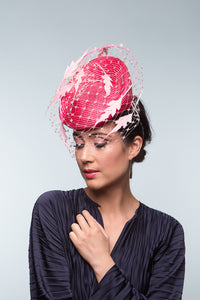 The Two-Toned Pink Raised Beret with Floating Feathers is an extremely comfortable beret base, trimmed with curved quills floating feathered leaves and a , fine vintage veiling.