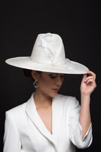 Load image into Gallery viewer, The White Concave Fedora with Sweeping Feathers is a modern fedora with a high angular concave crown and a wide flat brim