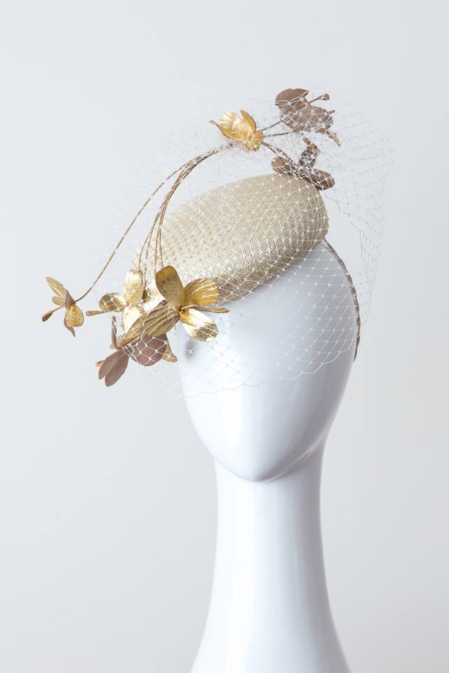 small button hat in gold straw with vintage veil and gold leather flowers