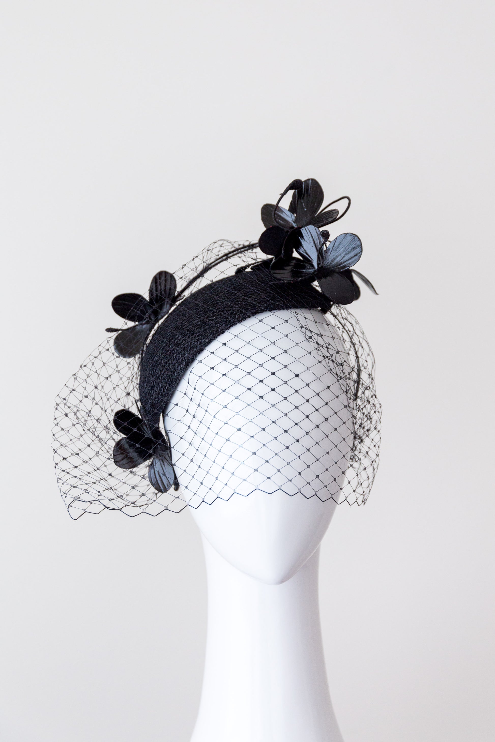 CASSIE- black side teardrop with  flowers and veiling