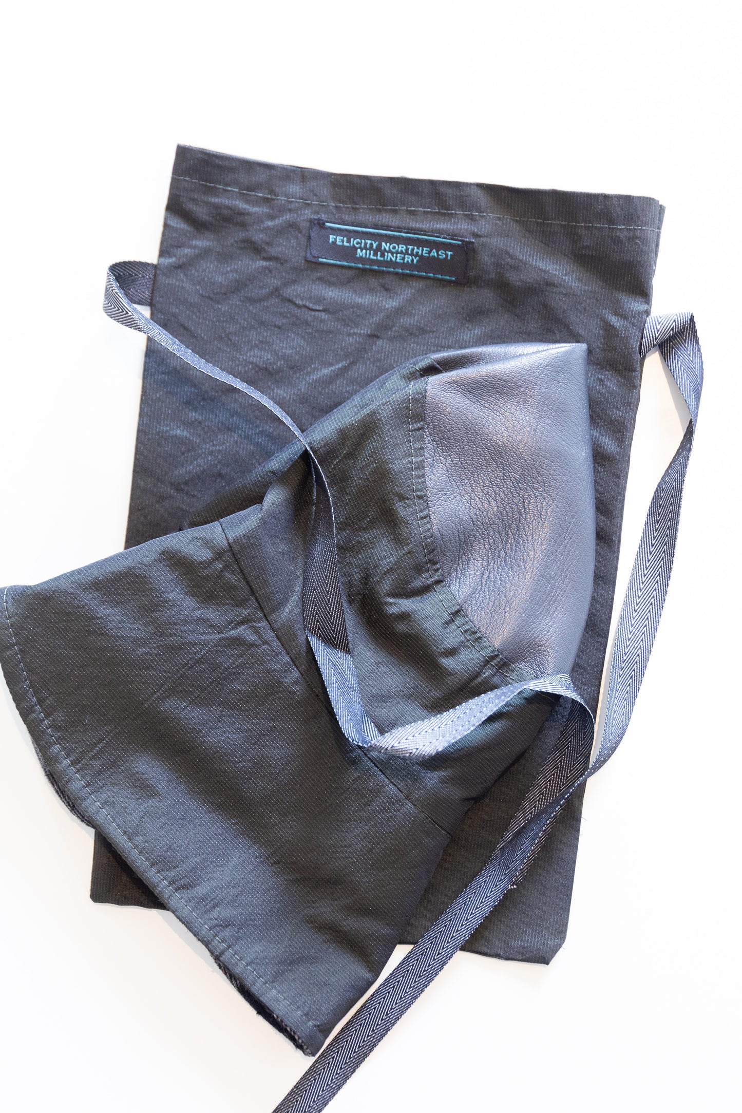 Foldable Bucket Rain Hat - Dark Green in waterproof travel bag by Felicity Northeast Millinery 