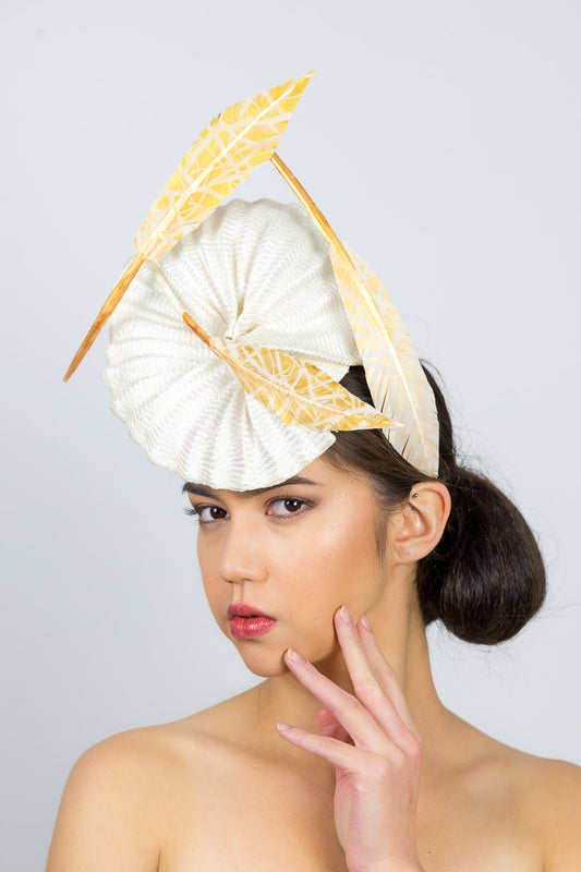 GEORGIA- a pleated straw headpiece with gold artisan feathers		