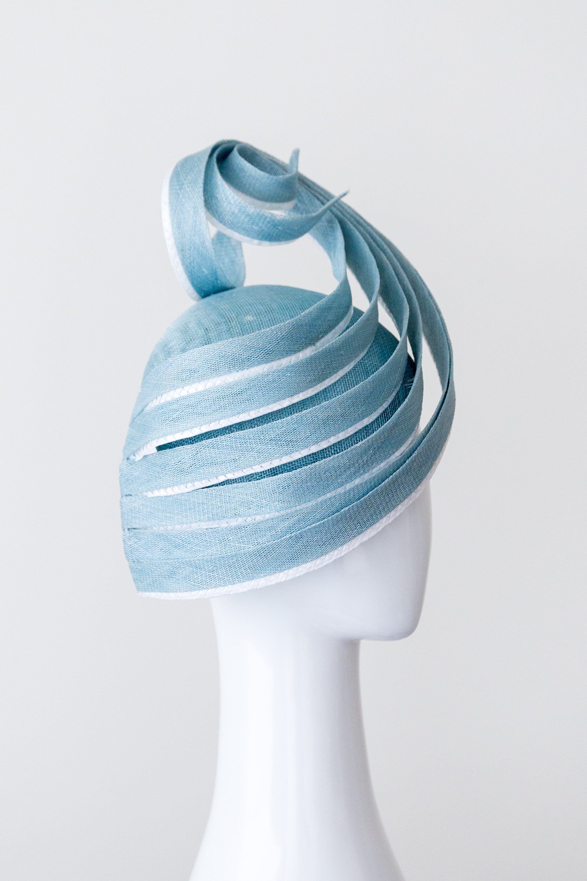 LEAH- pale blue sculptural hat with white highlights