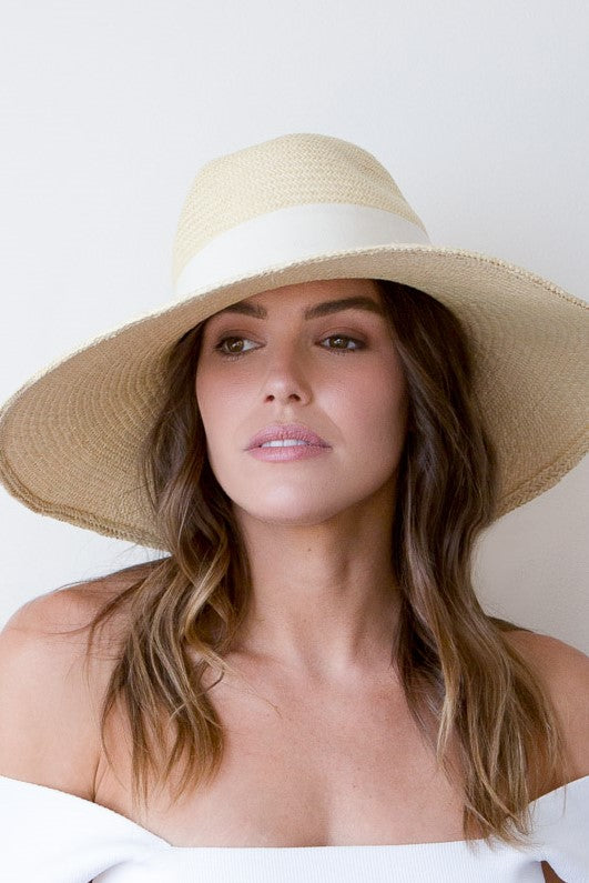 Natural panama fedora with soft brim and wide cream grosgrain ribbon