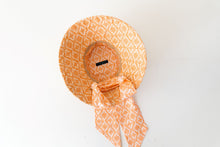 Load image into Gallery viewer, raffia and  orange and terracotta canvas bucket hat with scarf ,inside view
