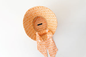 raffia and  orange and terracotta canvas bucket hat with scarf ,inside view