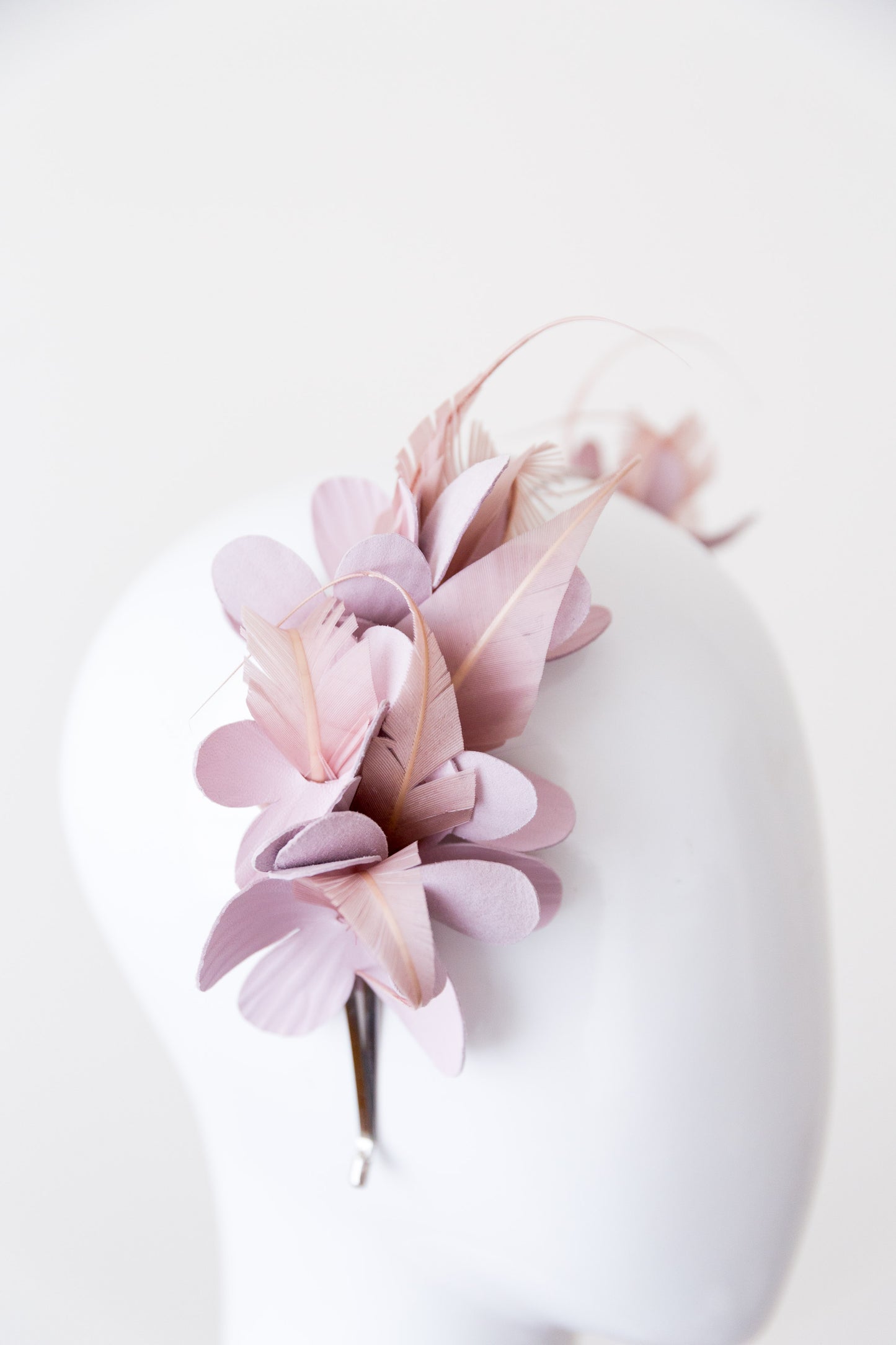 SAVANNAH-  leather flowers with pink feathers on a headband