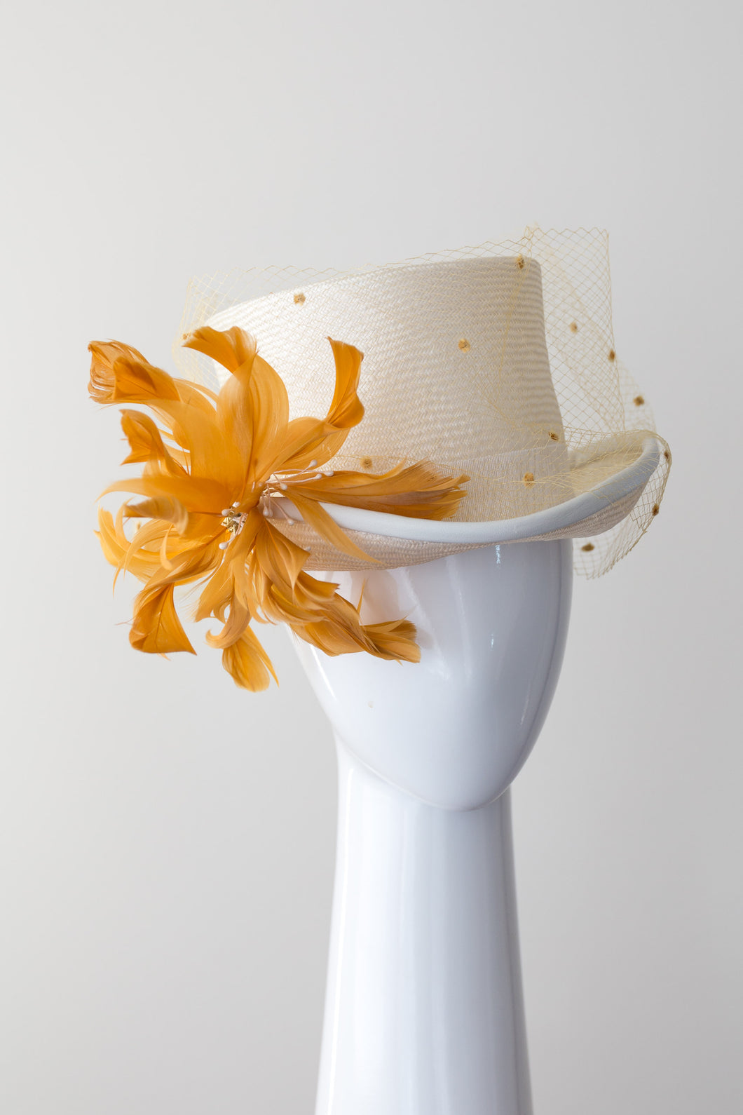 SIENNA-cream and mustard top hat with veiling and leather trim