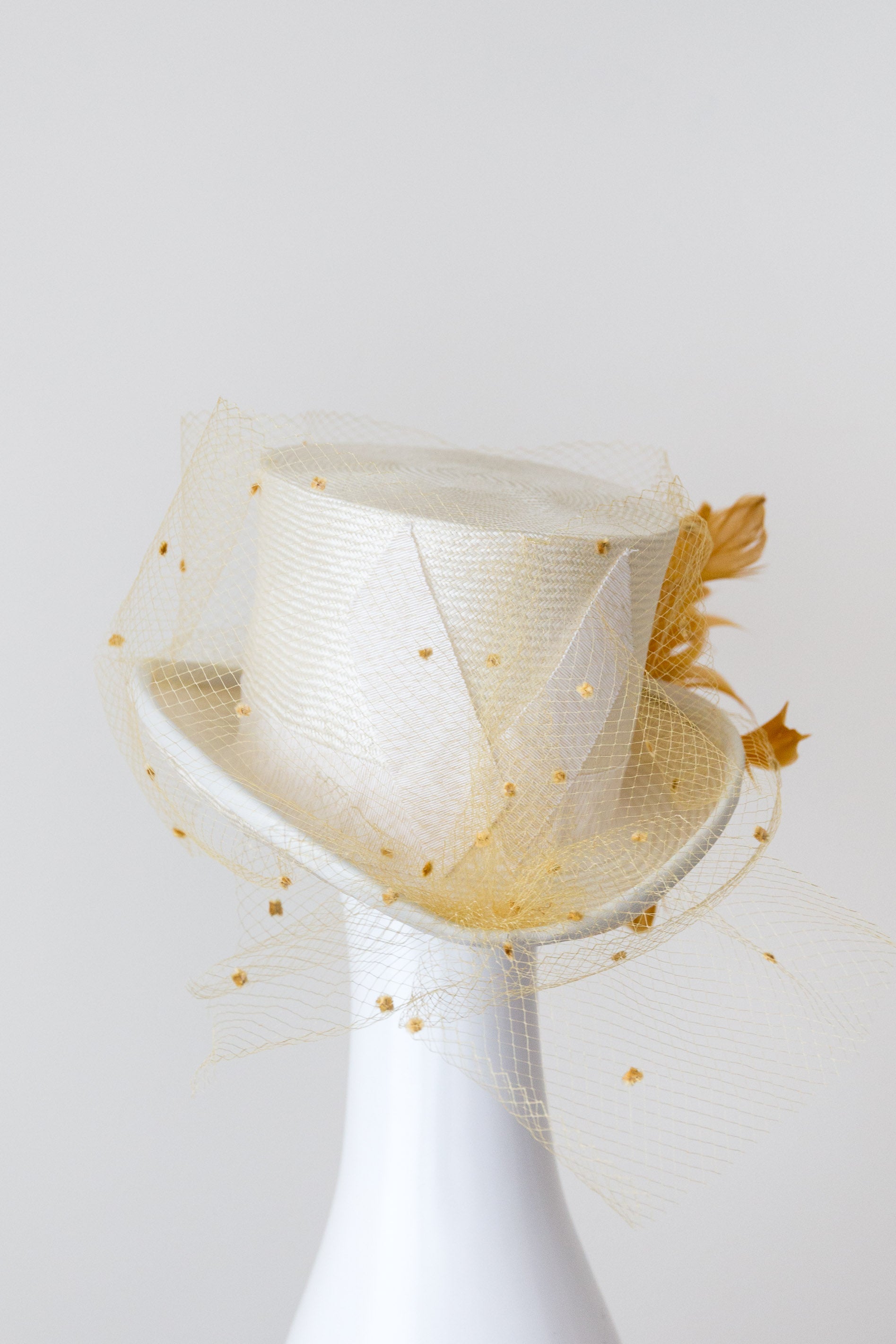 SIENNA-cream and mustard top hat with veiling and leather trim