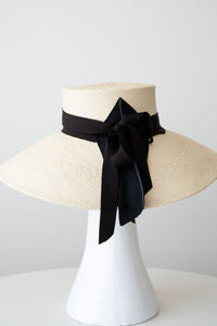 Wide brimmed cream panama sunhat with black  adjustableribbon ties, 