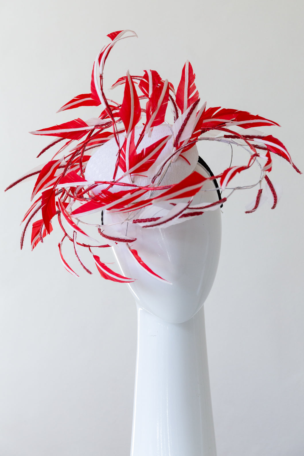 Sculptural Red and White Feather Hat