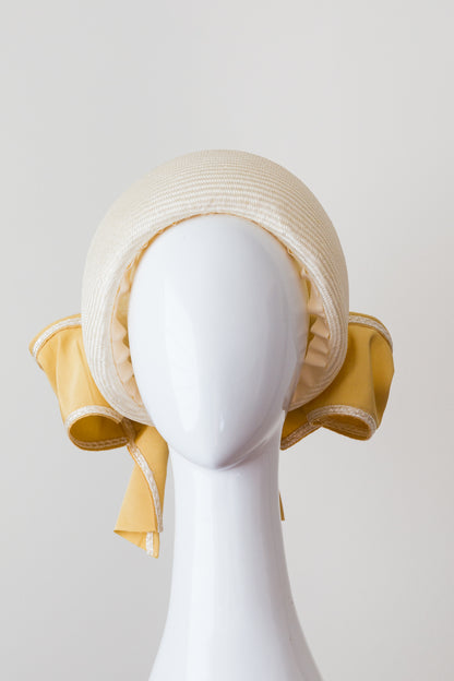 MEG- cream open pillbox with gold bow