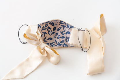 silk face mask, with ties. Inside fine cotton layer